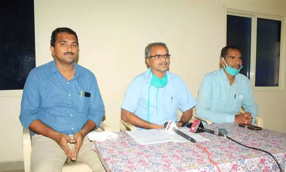 CPM leaders addressing the media in Eluru