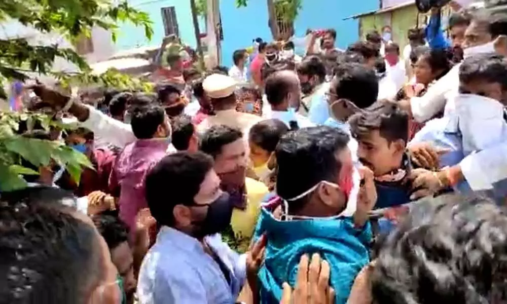 TDP MLA Ramakrishna Babu and activists attacked with stones in Visakhapatnam