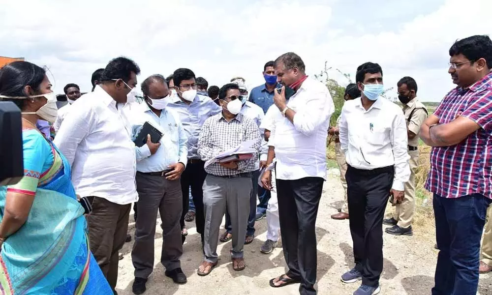 Minister Botcha Satyanarayana visiting house sites.