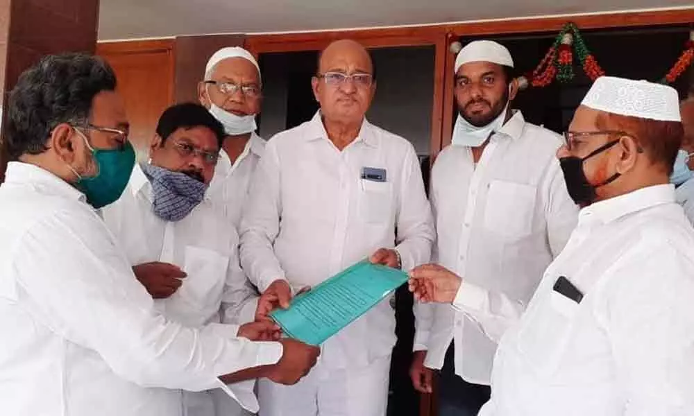 Muslim leaders JAC state convenor Shabbir Ahmed and others submitting the representation to MLA Gorantla Butchaiah Chowdary in Rajamahendravaram on Monday
