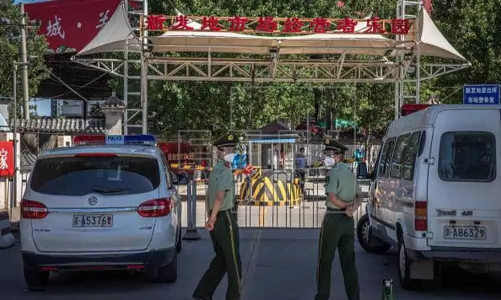 Beijing sacks officials amid fresh outbreak