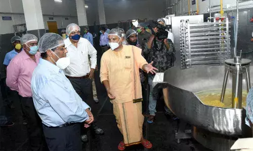 Sri City  MD Ravindra Sannareddy and Kaunteya Dasaji of Touchstone Foundation at the newly set up central kitchen on Tuesday