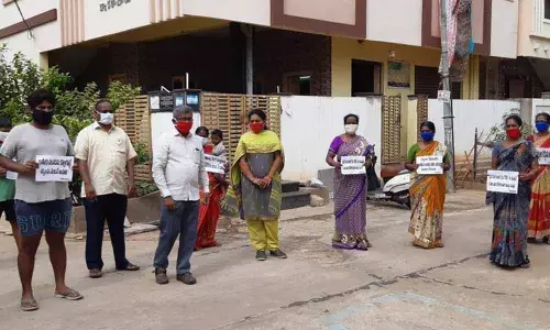 CPM activists staging a protest demonstration against the Centres ‘anti-people’  policies at Singh Nagar in Vijayawada on Tuesday