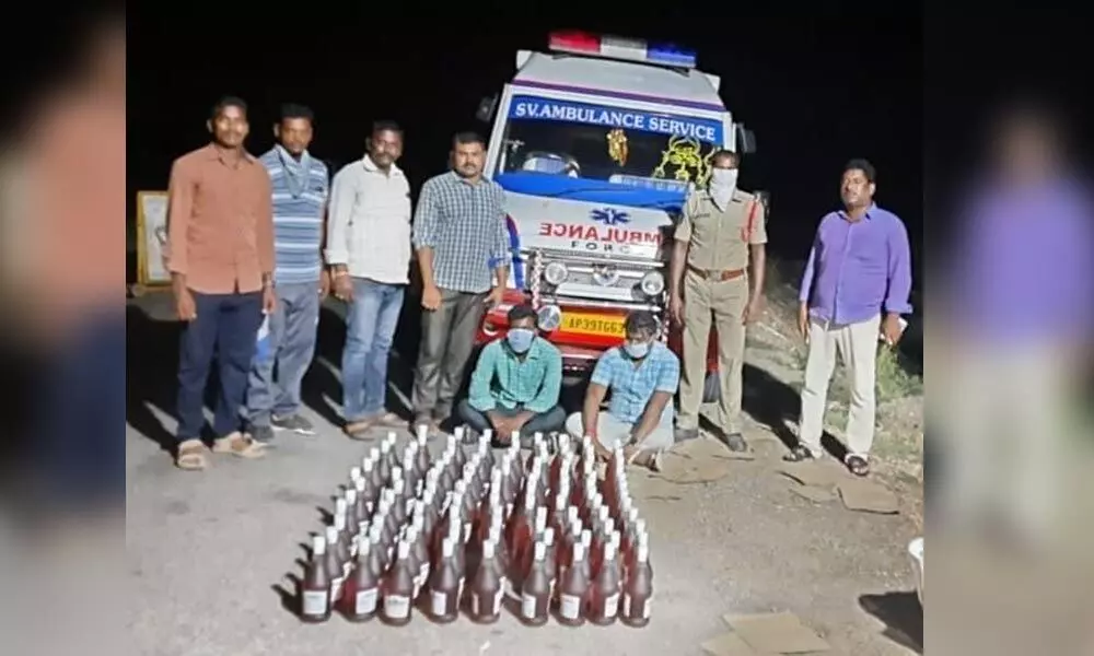 The ambulance used for smuggling liquor bottles near Donabanda check-post in Krishna district on Tuesday