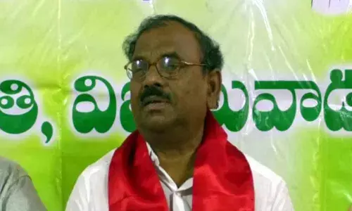 Police take AgriGold agents association president Muppalla Nageswar Rao into custody