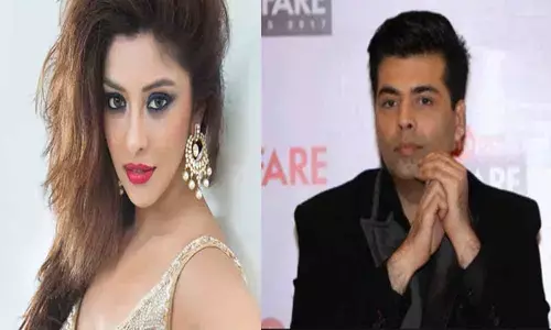 Payal Ghosh and Karan Johar