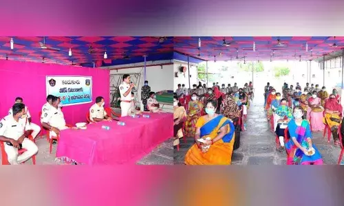 District Superintendent of Police Siddharth Kaushal addressing coronavirus awareness meeting at Kandukur police station in Prakasam district on Wednesday