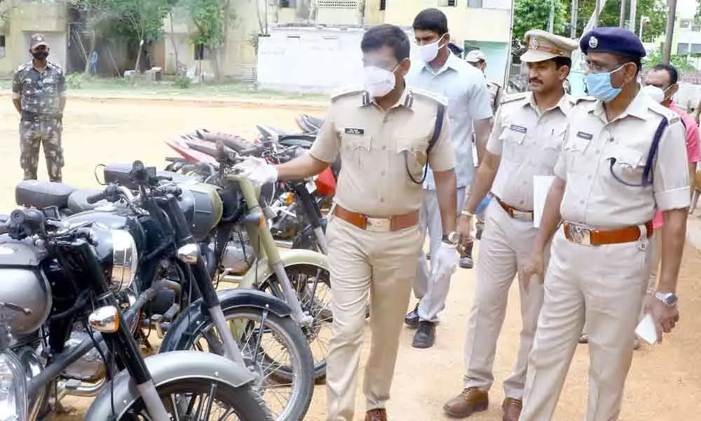 Urban SP A Ramesh Reddy inspecting the seized bikes at AR ground in Tirupati on Wednesday