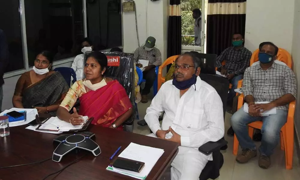 GMC Commissioner Challa Anuradha conducting videoconference from GMC office with the corporation officials on Wednesday