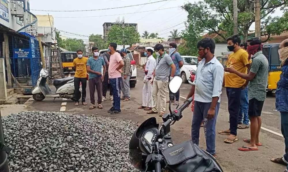 KMC Commissioner Swapnil Dinakar Pundkar inspecting sanitation works in Kakinada on Wednesday