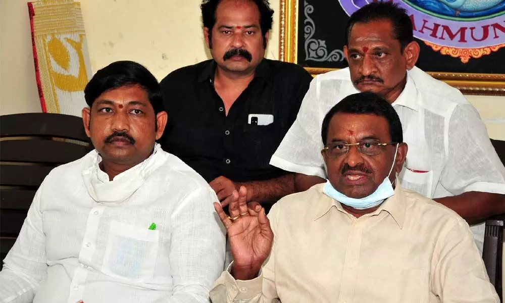 Former  Minister Pitani Satyanarayana speaking to reporters  at Press Club in Rajamahendravaram on Thursday