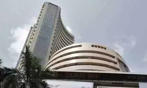 Markets end flat after see-saw trade