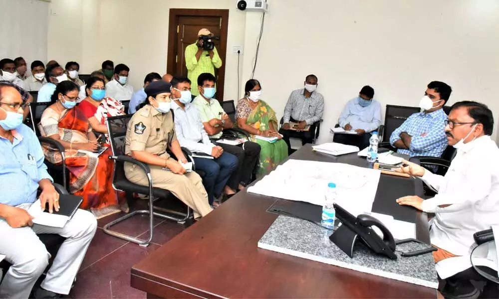Prakasam District Collector Dr Pola Bhaskara conducting a review meeting on lockdown in Ongole on Friday
