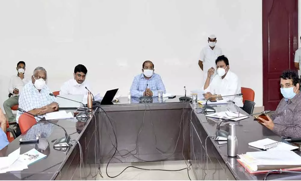District Collector A Md Imtiaz addressing medical personnel during a review meeting at his camp office in Vijayawada on Saturday