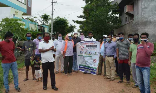 Residents of Brundavan Colony Development Society (BCDS) conducting a programme to create awareness about cleanliness in Arepally on Sunday