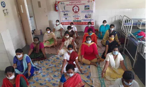 Women practising yoga at Disha Centre under the aegis of Women and Child Welfare Department in Guntur city on Sunday