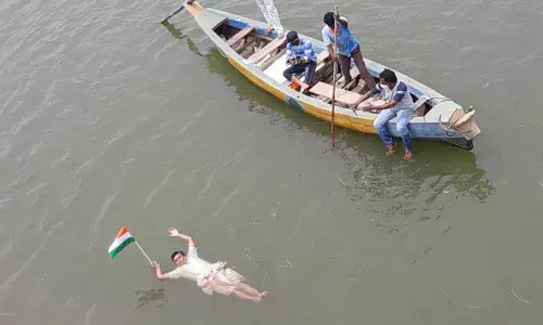 Yoga Master V Kameswara Sharma lying on the water of Gowtami tributary of the  Godavari river at Muralmmalla village on Sunday