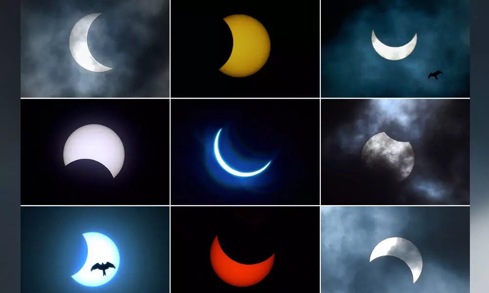 Combination of nine photos, shows the moon moving in front of the sun during the annular solar eclipse