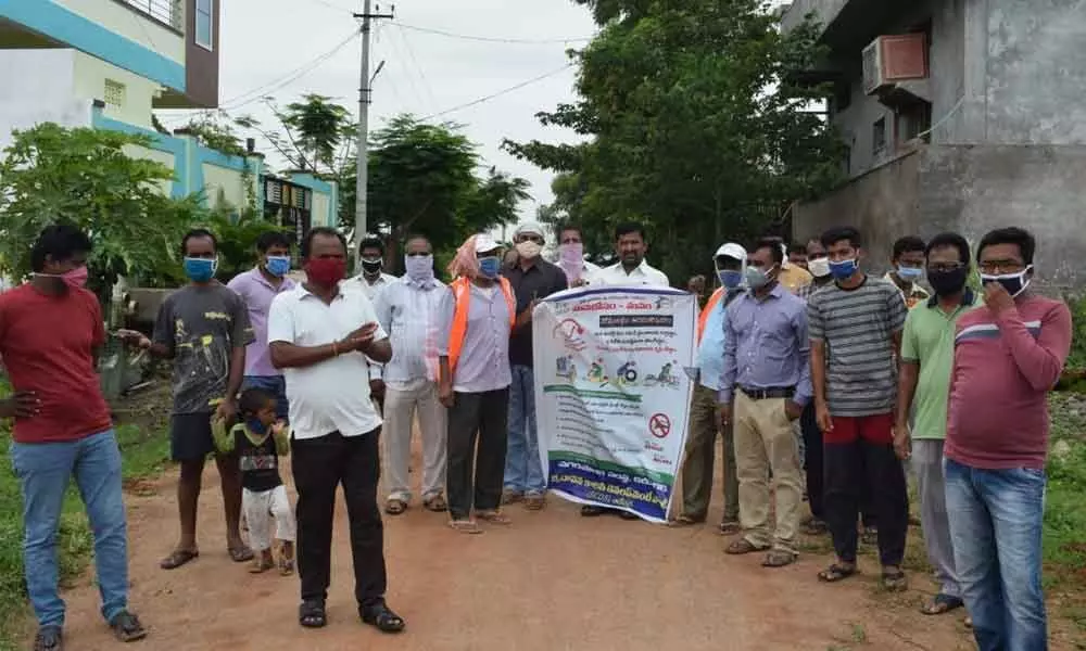 Residents of Brundavan Colony Development Society (BCDS) conducting a programme to create awareness about cleanliness in Arepally on Sunday