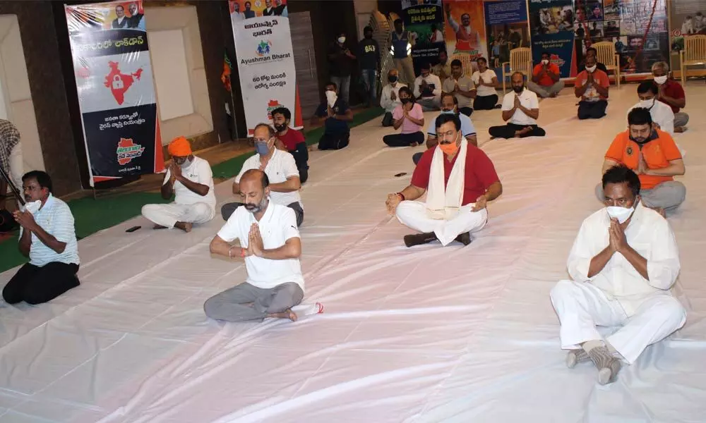 Telangana BJP president Bandi Sanjay Kumar participating in  International Yoga Day celebrations