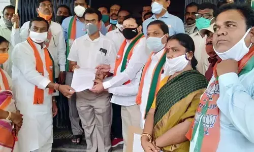 BJP district leaders submitting a memorandum to the DM&HO in Mahbubnagar on Monday