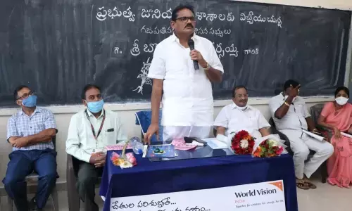 MLA B Appalanarasaiah distributing lab equipment to Government Junior College, Gantyada