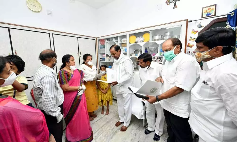 CM KCR consoles Colonels family, hands over Rs 5 cr cheque