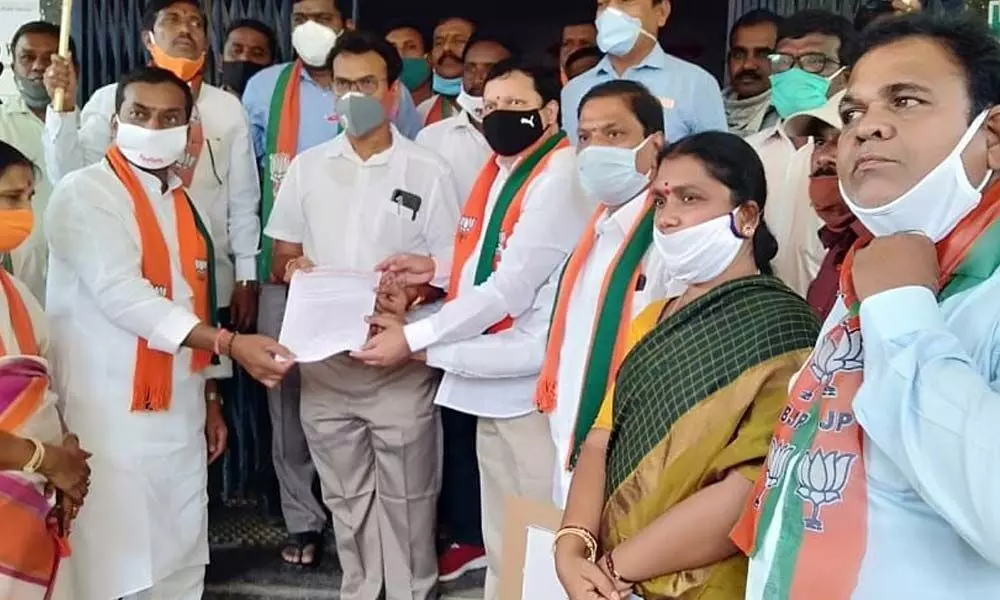 BJP district leaders submitting a memorandum to the DM&HO in Mahbubnagar on Monday
