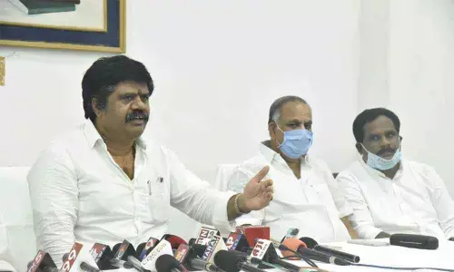 Tourism Minister M Srinivasa Rao speaking at a press conference in Visakhapatnam on Tuesday