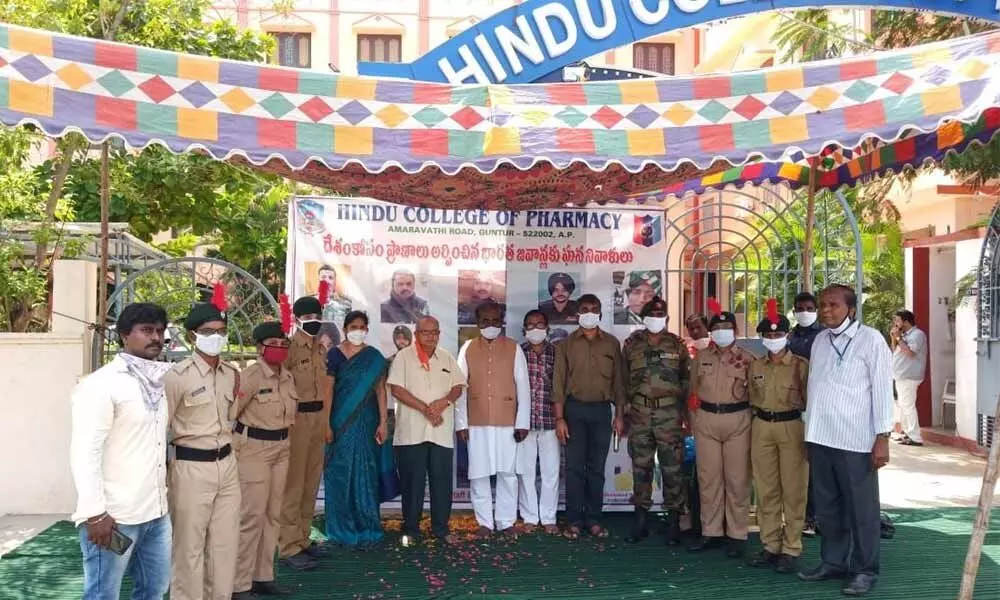 Former Minister and BJP leader Ravela Kishore Babu and Hindu Pharmacy College chairman Jupudi Ranga Raju