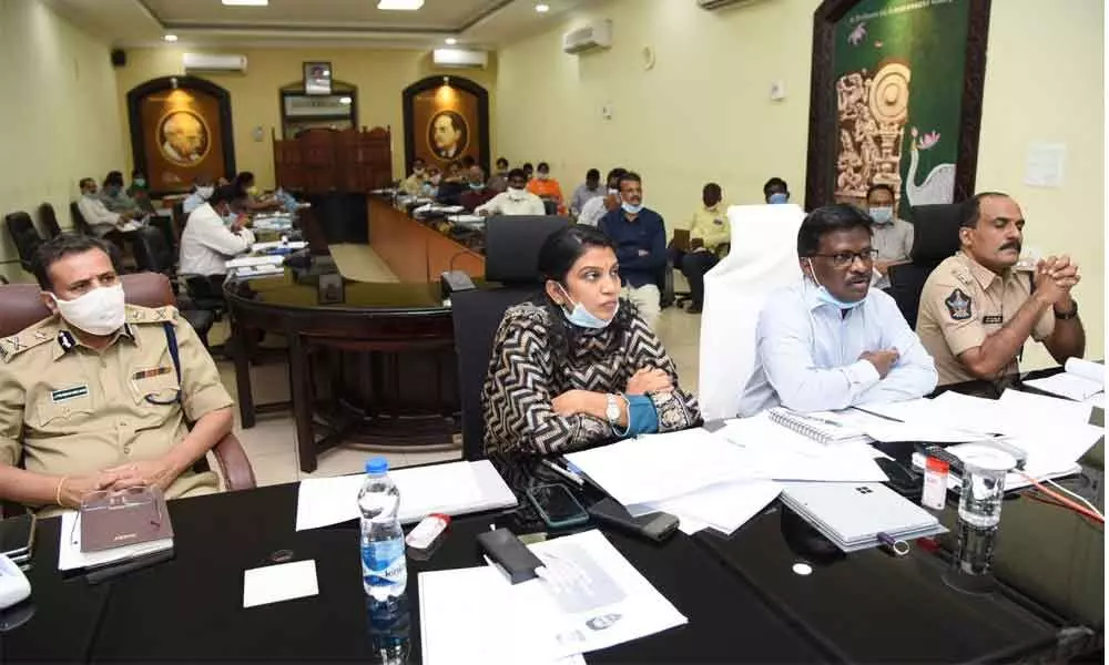 District Collector I Samuel Anand Kumar participating in the CMs videoconference from Collectorate in Guntur city on Tuesday