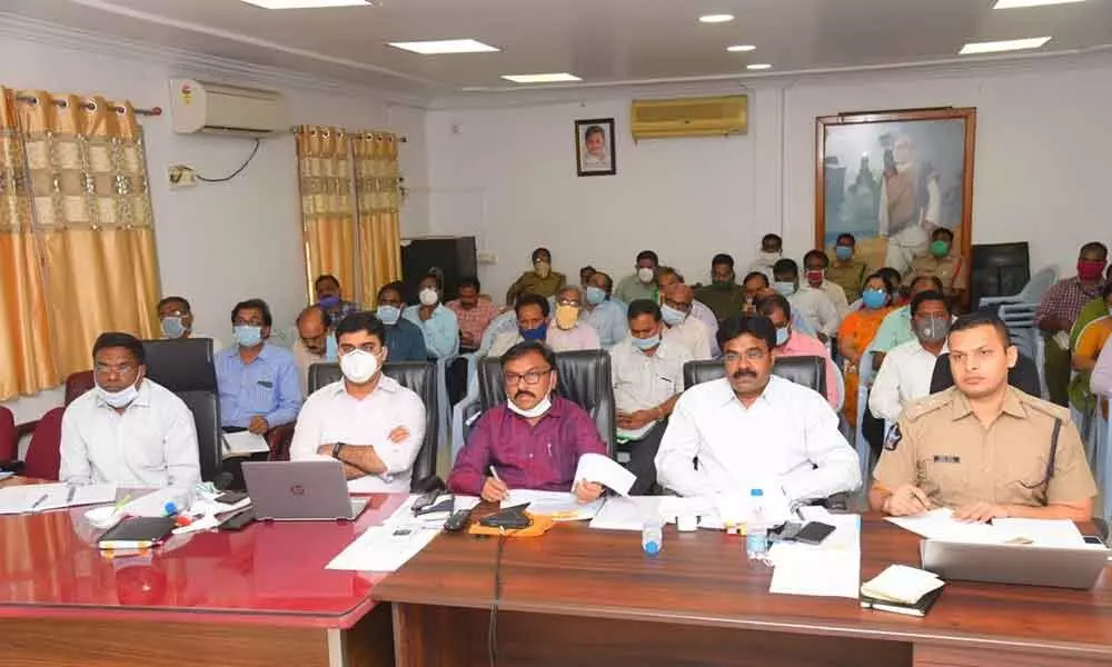 Prakasam District Collector Dr Pola Bhaskara and SP Siddharth Kaushal participating in a video-conference with the Chief Minister from Ongole on Tuesday