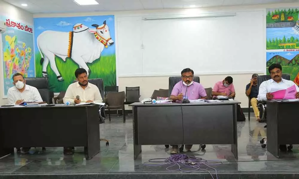 Prakasam District Collector Dr Pola Bhaskara speaking at the DCC & DLRC meeting in Ongole on Tuesday