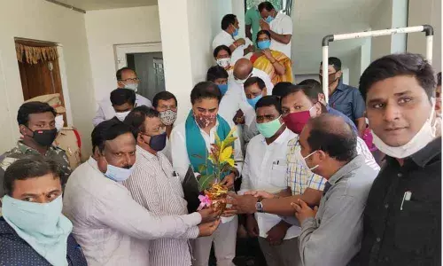 Cooperative TNGO leaders presenting a sapling to IT and Municipal Minister  KT Rama Rao in Hyderabad on Tuesday