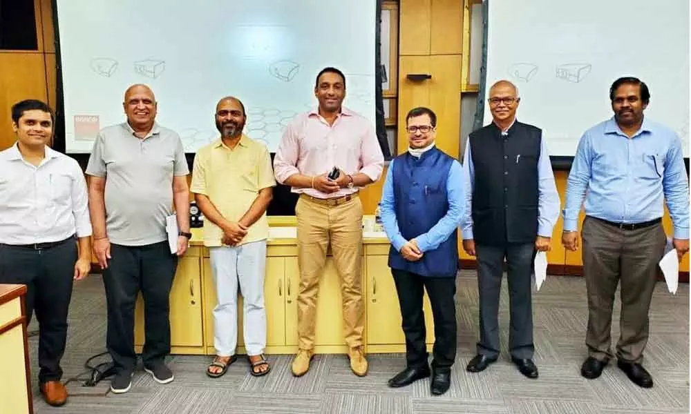 Minister for Industries, IT and Skill Development Mekapati Goutham Reddy with professors at ISB in Hyderabad on Wednesday