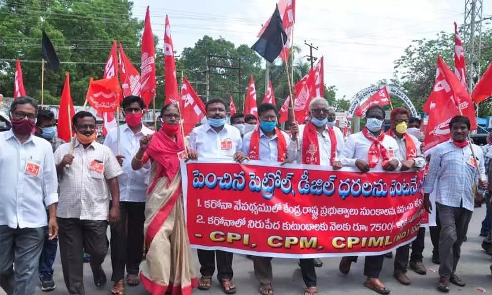 Left party leaders taking out a rally in Khammam city on Thursday