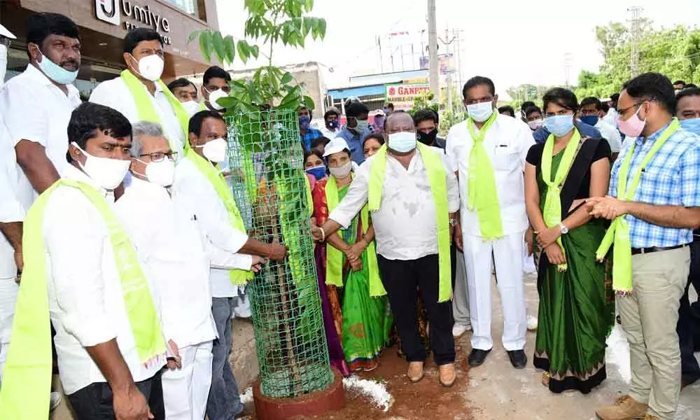 BC Welfare Minister Gangula Kamalakar planting a sapling at RTC workshop in Karimnagar on Thursday