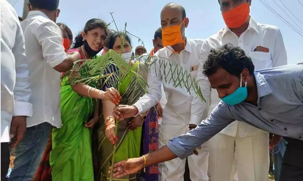 BJP Stare president and MP Bandi Sanjay Kumar participating in sixth phase of Haritha Haram drive in Vemulawada on Thursday