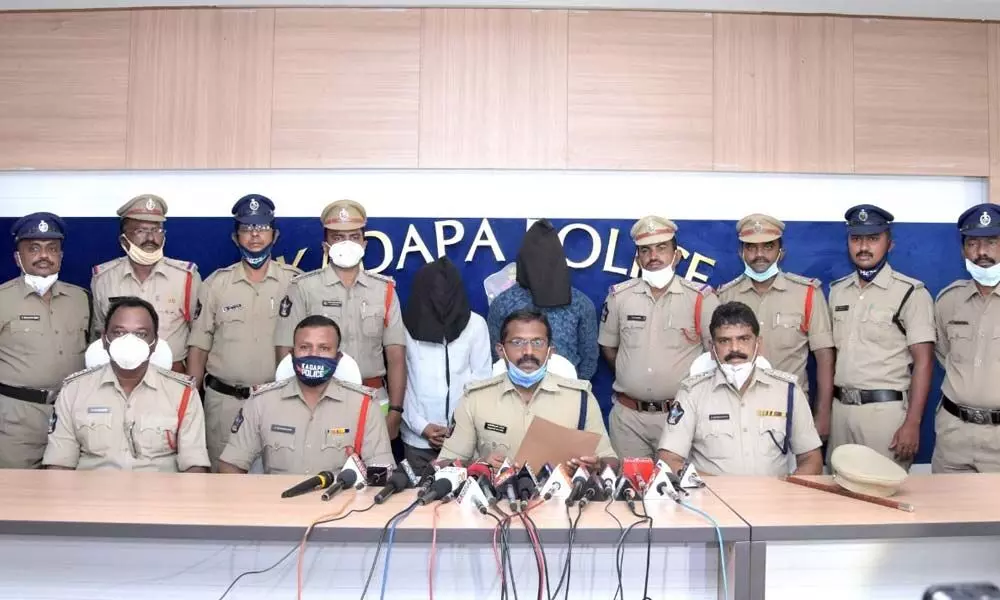 Police officials presenting the arrested persons in the murder case
