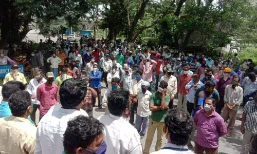 Union leaders addressing contract labourers at the two-day strike that began in Visakhapatnam Steel Plant on Friday