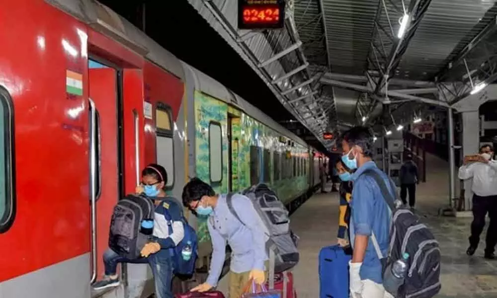 Occupancy in trains from migrant heavy states to cities 100 per cent; signs of recovery: Railways