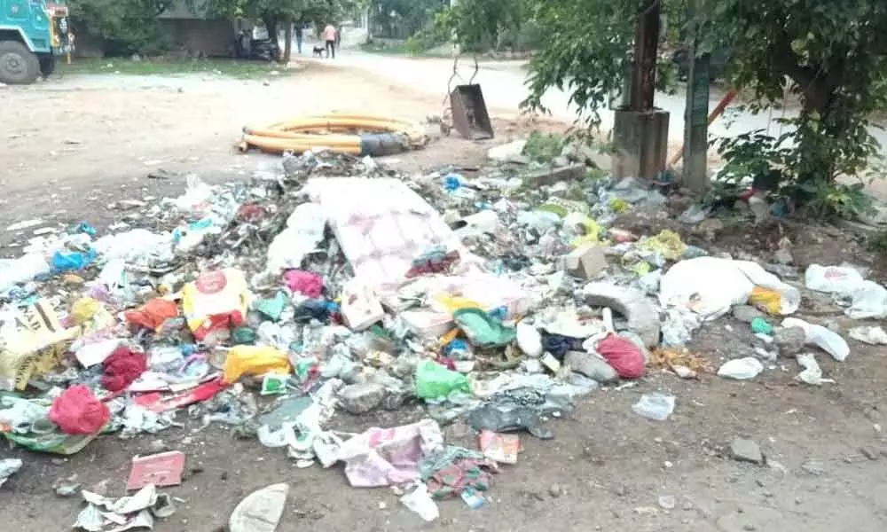 Garbage dumped at roadside in Alwal