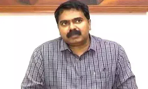 Collector MV Seshagiri Babu