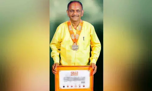 M. Srinivasa Rao with Asia Book of Records honour
