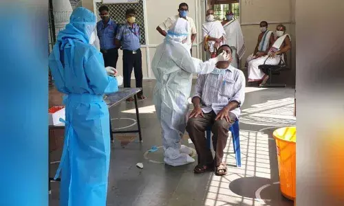 Swab samples being collected from Simhachalam temple staff in Visakhapatnam