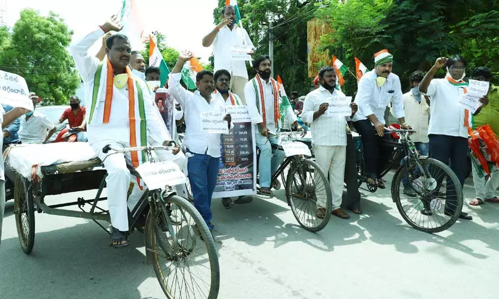 Congress activists stage protest against hike in fuel prices
