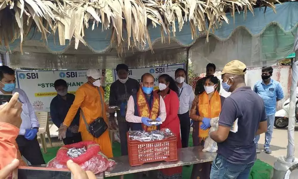 SBI food donation programme at Krishnalanka in Vijayawada