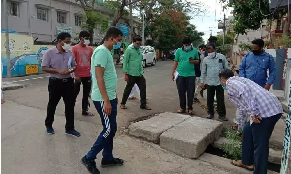 KMC Commissioner Swapnil Dinakar Pundkar inspecting sanitation in Kakinada on Monday