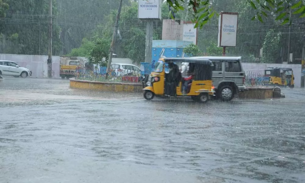 Rainwater inundated roads in Guntur on Monday