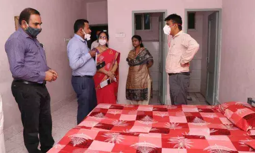Municipal  Commissioner PS Girisha, Joint Collector – Development V Veerabrahmam and other officials inspecting the rooms at Srinivasam in Tirupati on Tuesday